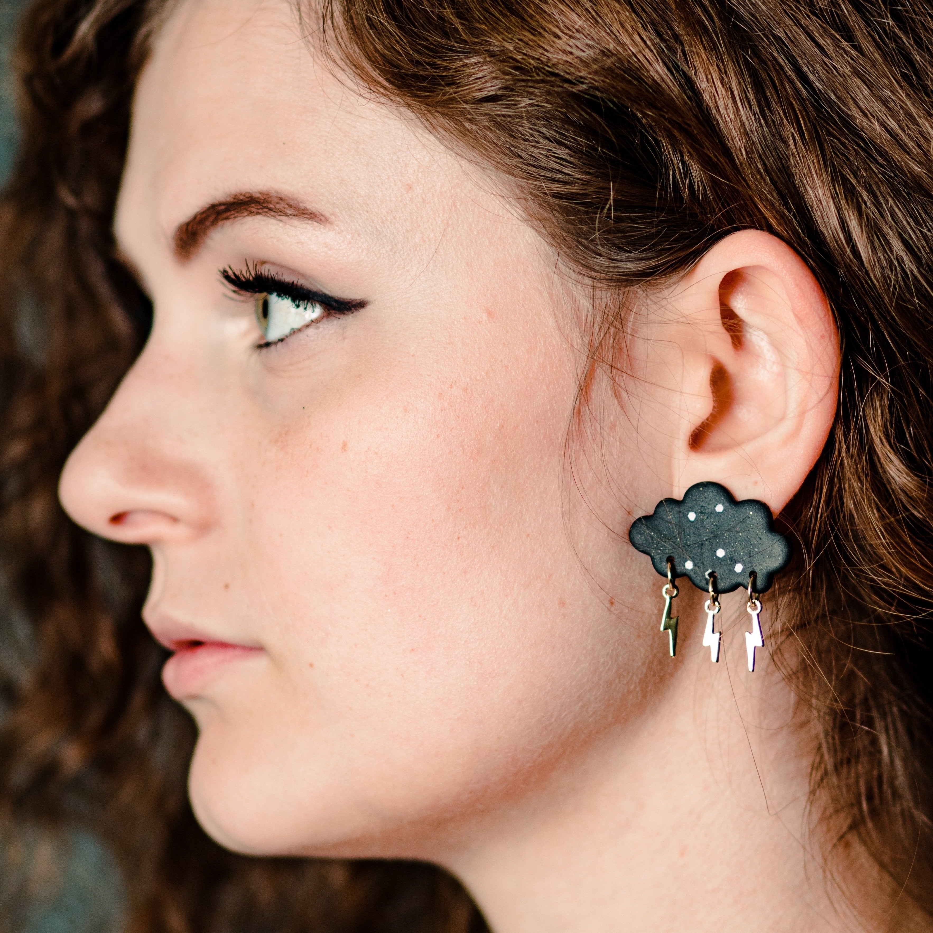 Hand crafted cloud and lightning earrings. 